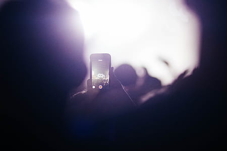 person holding smartphone thumbnail