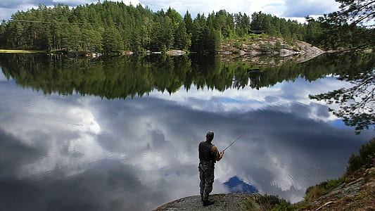 man fishing on the lake thumbnail