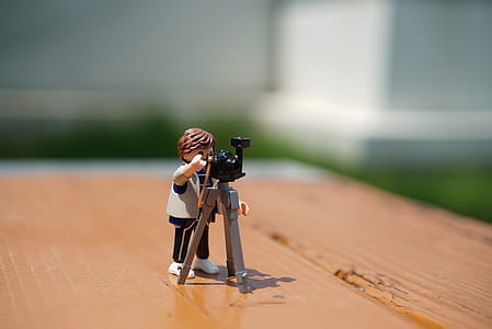 gray and black minifig on brown surface thumbnail