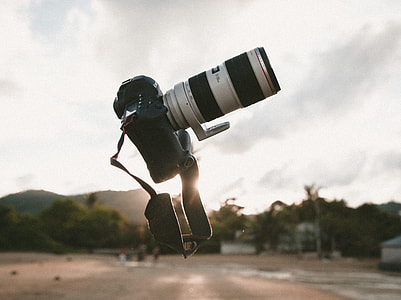 black and white DSLR camera thumbnail