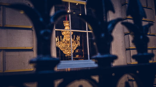 lighted chandelier inside house thumbnail