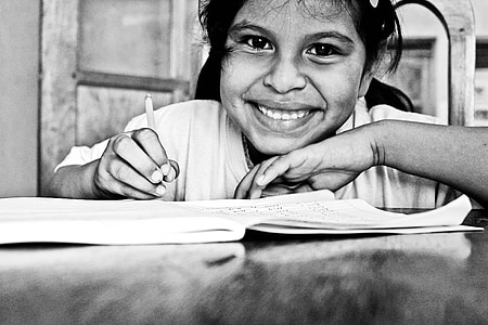 girl holding pen thumbnail