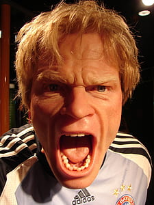 closeup photo of man wearing Adidas top open mouth thumbnail