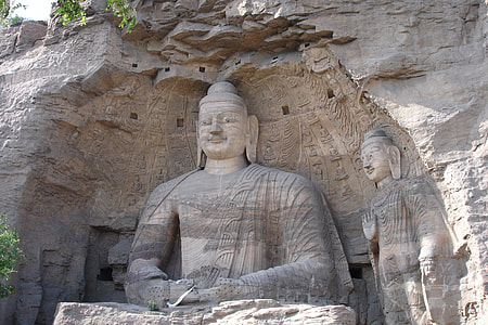 Gautama high-relief rock sculpture during daytime thumbnail