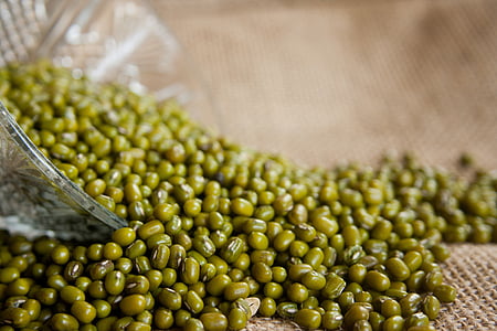 green mung beans on brown knit textile thumbnail