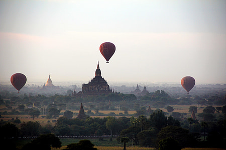 three red flying hot air balloons thumbnail