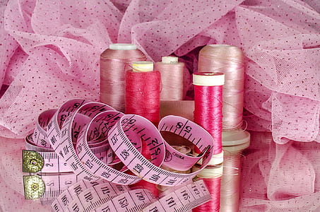 sewing thread and tape measure on ribbon thumbnail