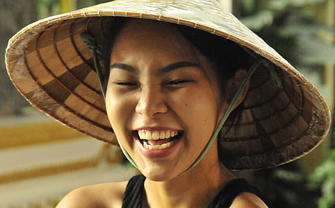 closeup photo of woman wearing hat thumbnail
