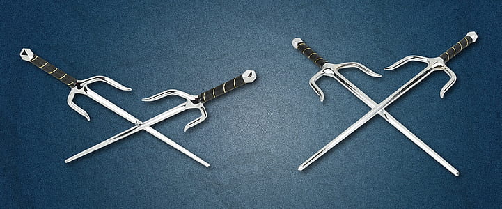 two pairs of gray sai swords wallpaper thumbnail