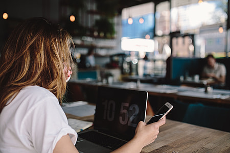 Young woman working in a cafe thumbnail