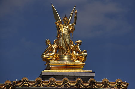 gold-colored angel statue at daytime thumbnail