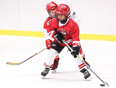 two men playing ice hockey thumbnail