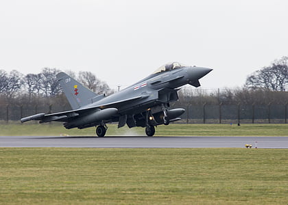 running gray plane on road thumbnail