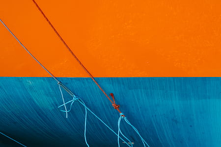 red and blue rope on blue and orange wall thumbnail