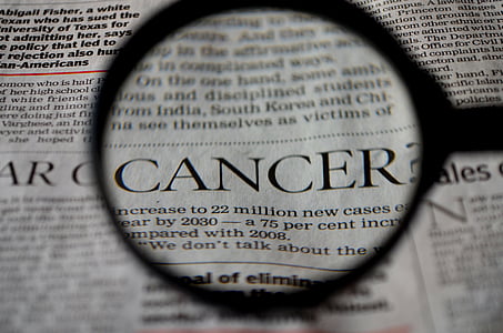 magnifying lens on newspaper thumbnail