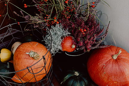 Pumpkins and flowers as decoration on stairs thumbnail