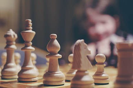 brown wooden chess piece thumbnail