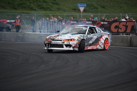 rally car drifting in corner track in a race thumbnail