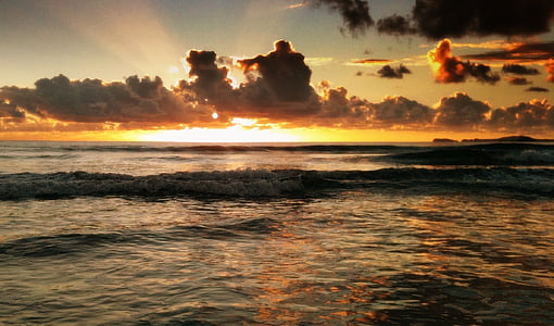 ocean waves during golden hour thumbnail