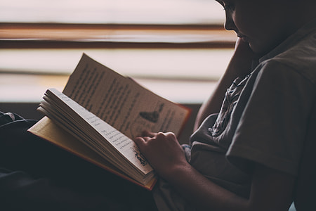 child reading book thumbnail