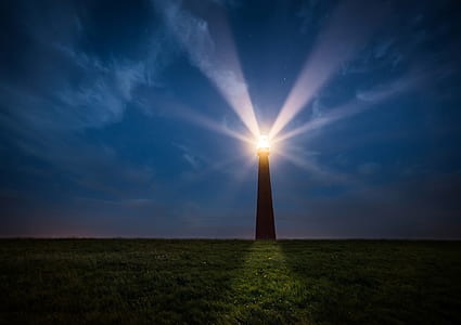 silhouette photo of lighthouse thumbnail
