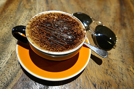 aviator sunglasses beside of mug thumbnail