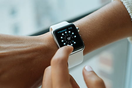 person wearing silver smartwatch thumbnail
