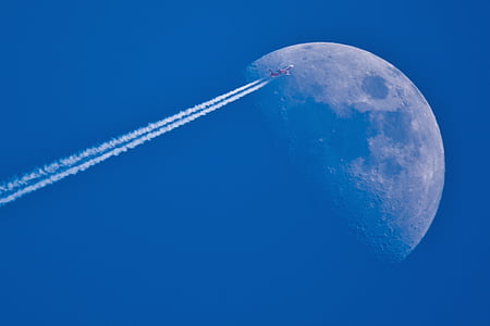 jet plane view with moon thumbnail