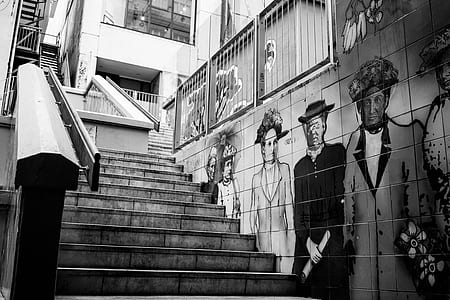 grayscale photo of graffiti at the staircase area thumbnail