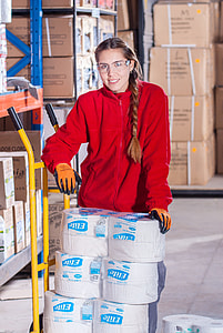 woman near yellow hand truck thumbnail