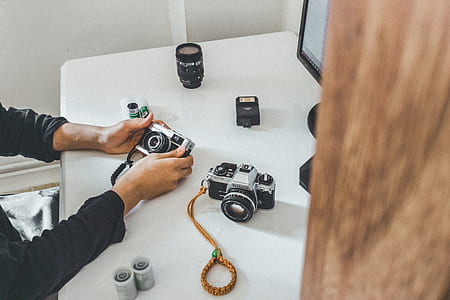 two cameras on table thumbnail