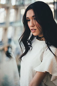 woman in white crew-neck T-shirt thumbnail