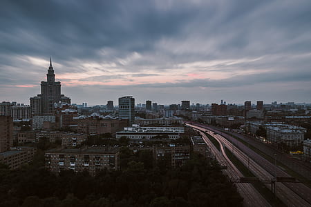 aerial photo of building under cloudy sky thumbnail