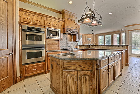 brown wooden kitchen isle thumbnail
