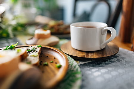 Breakfast served with tea, bread and eggs thumbnail