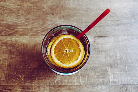 cup of lemon juice on brown wooden surface thumbnail