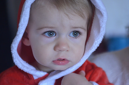portrait photo of child in red hoodie jacket thumbnail
