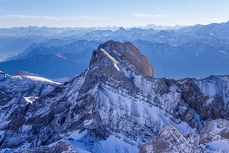 bird's-eye view photography of gray and white mountain thumbnail