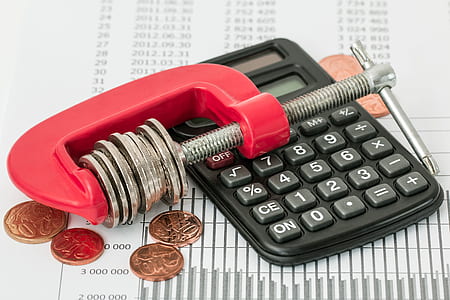 red and gray clamp tool and desk calculatior thumbnail