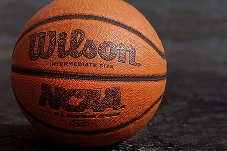 photography of brown Wilson NCAA basketball thumbnail
