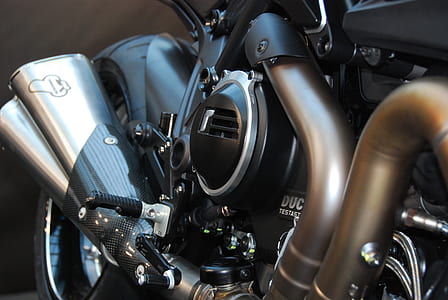gray motorcycle muffler thumbnail