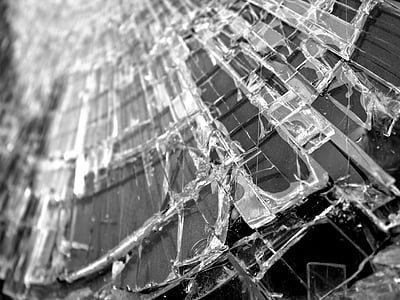 grayscale close up photography of crushed glass thumbnail