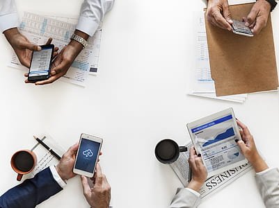 people holding gadgets thumbnail