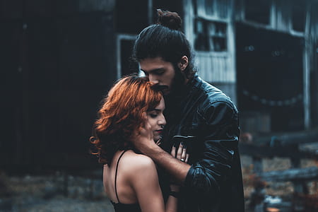 man and woman hugging while standing thumbnail