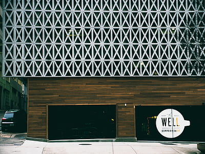 white and black Well signage on glass door thumbnail
