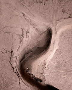 aerial photo of land formation during daytime thumbnail