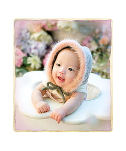 baby sitting in white chair thumbnail