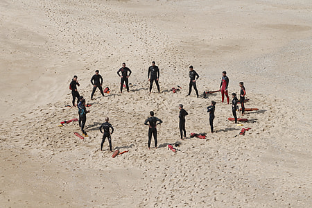 people on sand ground under sunny sky thumbnail