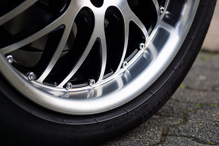 chrome multi-spoke vehicle wheel and tire thumbnail