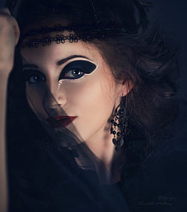 woman wearing black top with makeu thumbnail